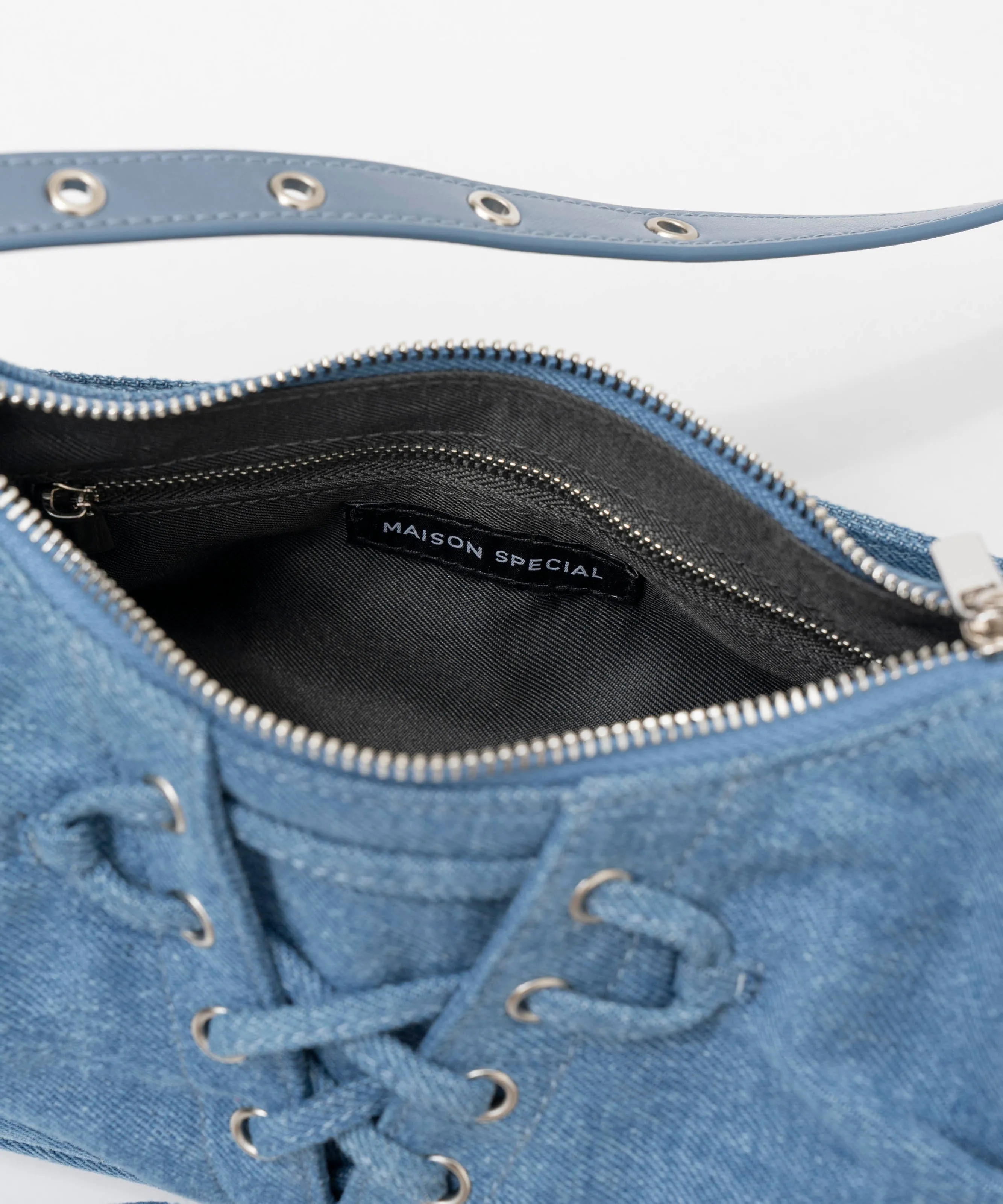 Lace Up Denim Saddle Bag