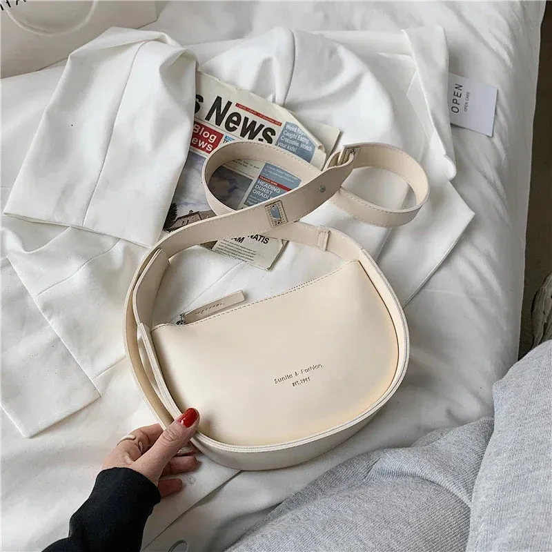 Uniwim Mira Arc Saddle Crossbody Bag